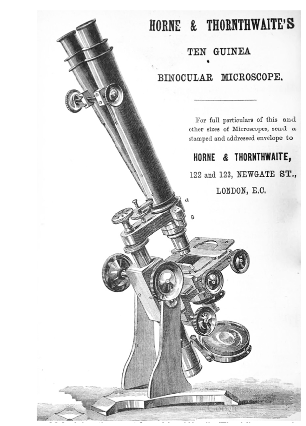 A black and white image of a microscope
Description automatically generated
