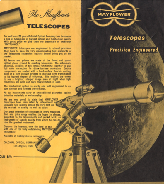 A telescope on a tripod
Description automatically generated