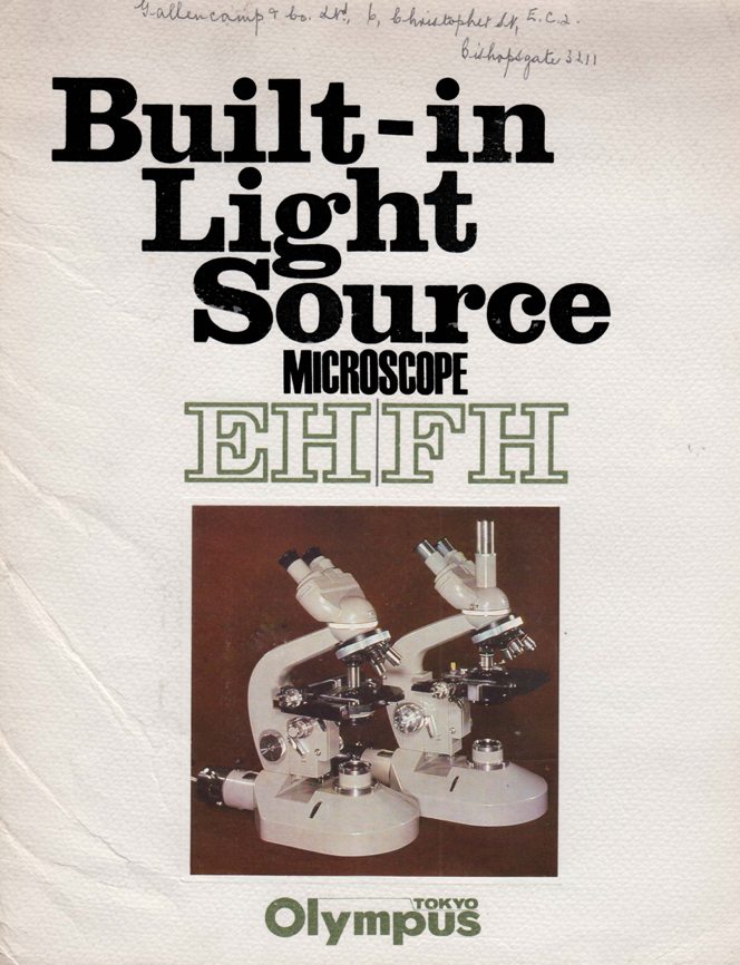 A white microscope with black text
Description automatically generated