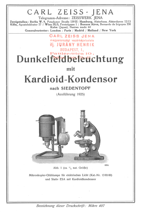A black and white poster with a couple of microscopes
Description automatically generated
