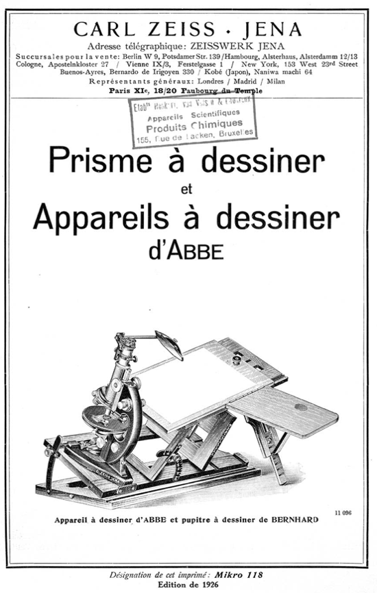 A black and white photo of a microscope
Description automatically generated