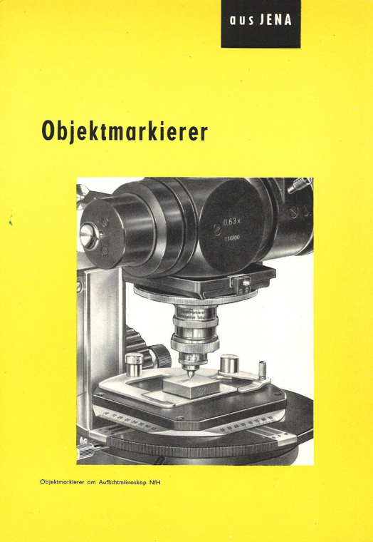 A close-up of a microscope
Description automatically generated