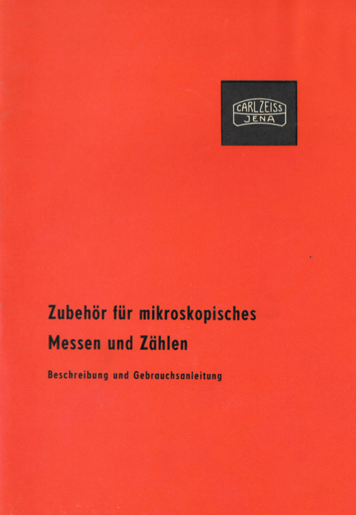 A red cover with black text
Description automatically generated