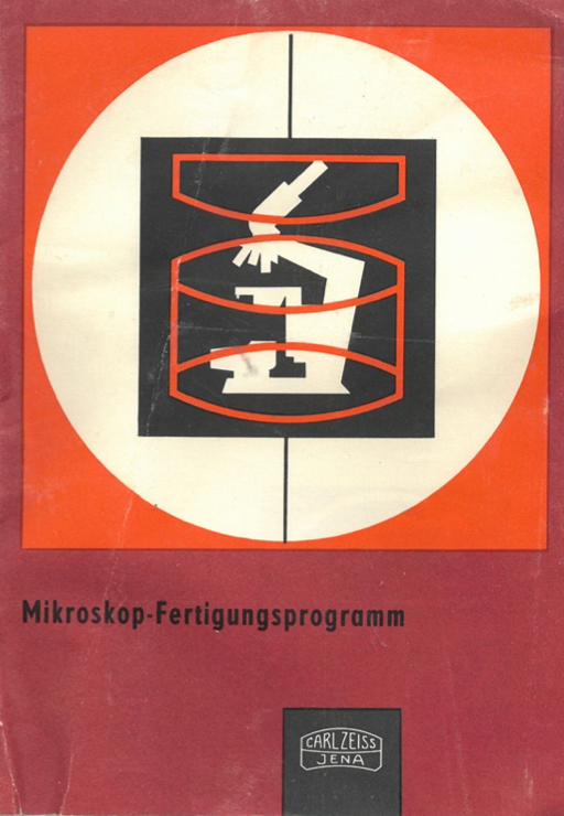 A red and white sign with a microscope
Description automatically generated