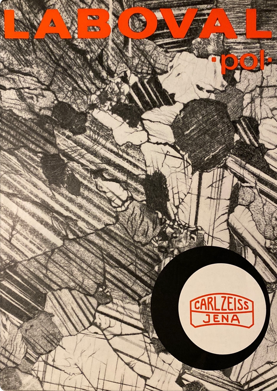 A black and white cover with a white circle and black text
Description automatically generated