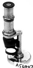 A close-up of a microscope
Description automatically generated