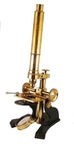 A picture containing table, old, street, man
Description automatically generated