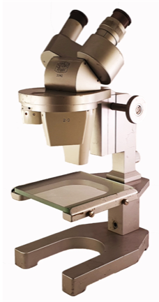 A close-up of a microscope
Description automatically generated