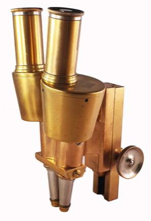 A gold and silver binoculars
Description automatically generated